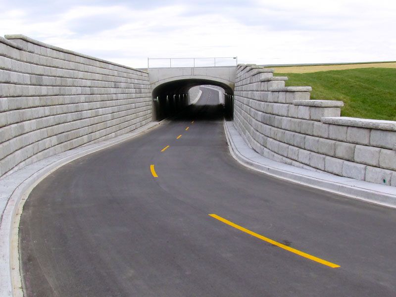 A road with a tunnel in the middle of it