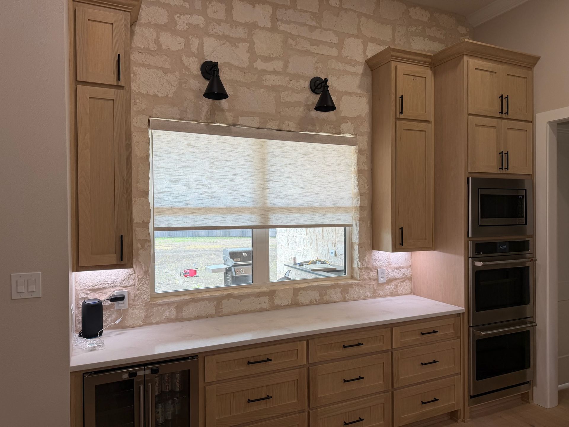 Love is Blinds Custom Blinds Shades and Shutters | Motorized Shade Kitchen After