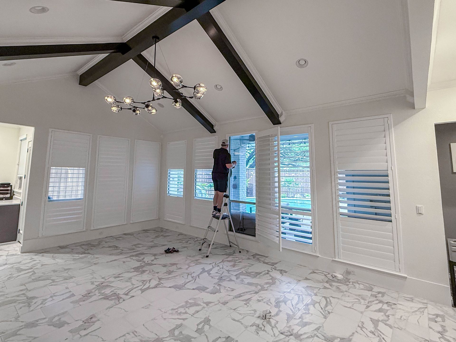 Plantation shutters install supporting resale value in a Frisco, TX home