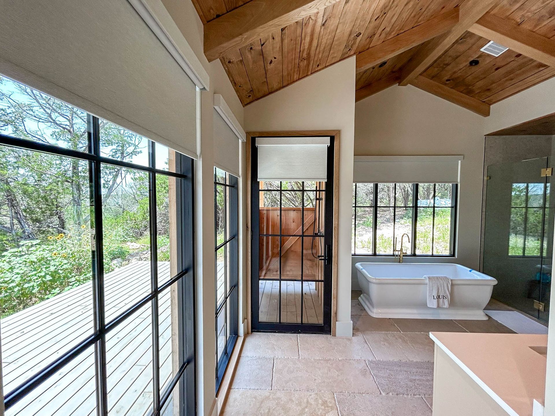 Custom roller shades in a Texas living room