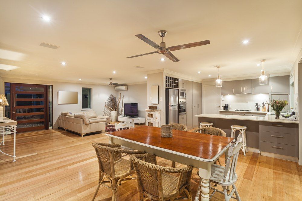 Open-concept Living Space With Dining Area, Kitchen, And Living Room — Aliance Group in Grafton, NSW