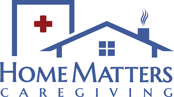 The logo for home matters caregiving shows a house with a red cross on the roof.