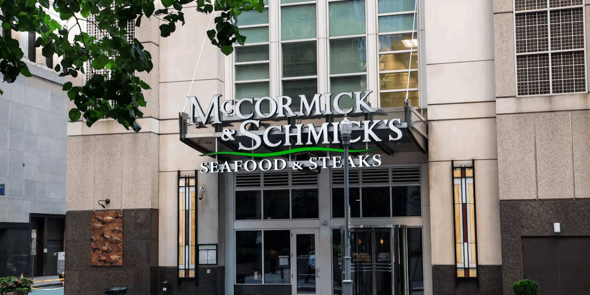 A building with a sign that says mccormick 's on it
