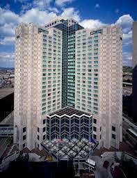 An aerial view of a large building with a lot of windows.