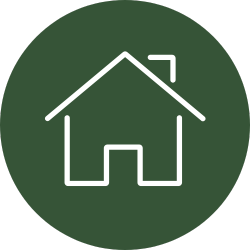 A line drawing of a house with a chimney in a green circle.