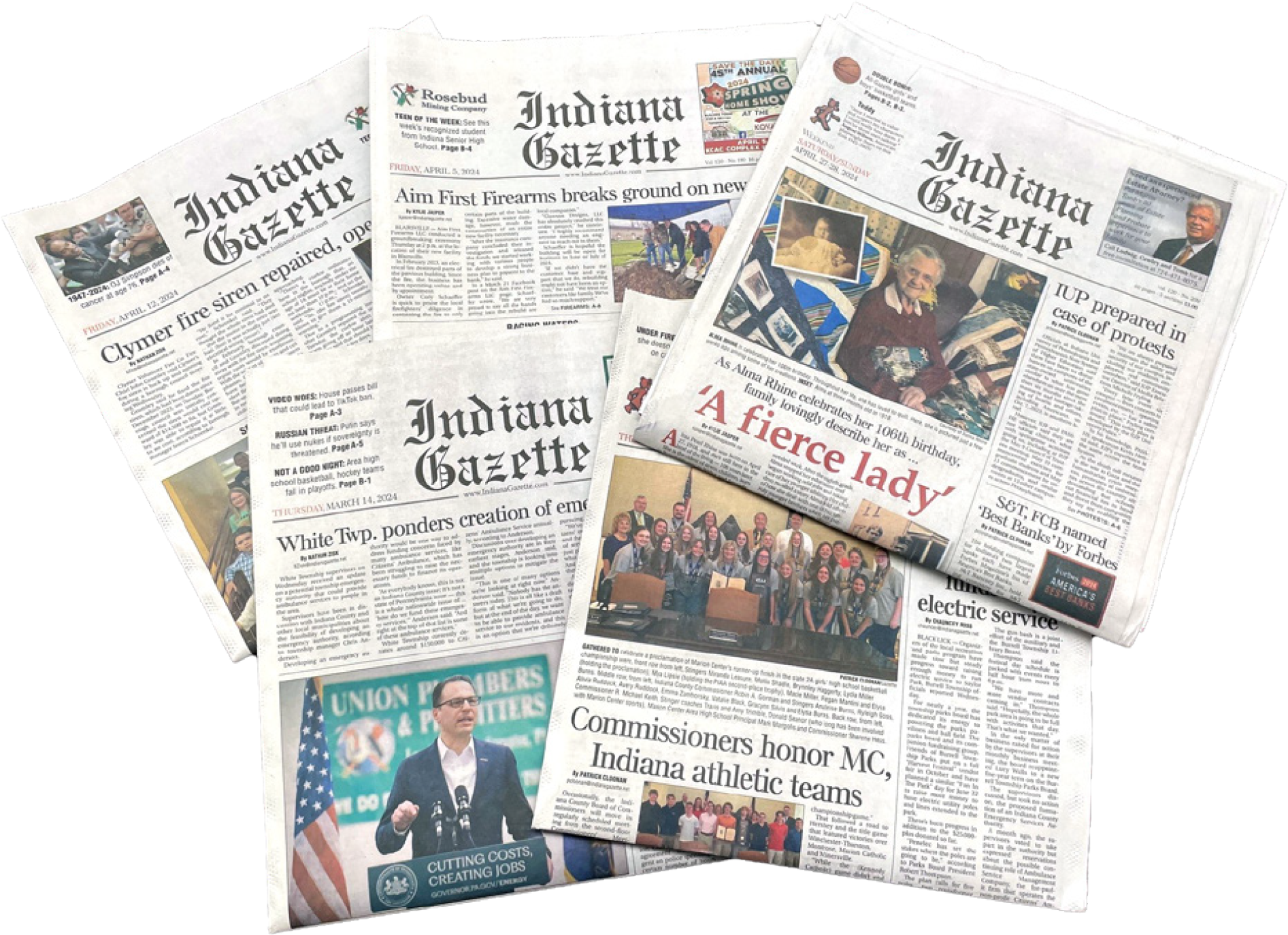 A bunch of indiana gazette newspapers are stacked on top of each other.