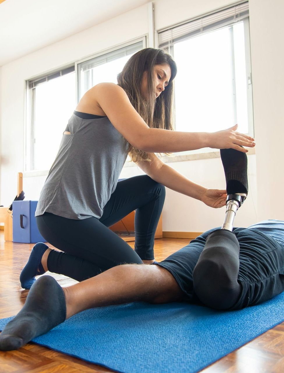 A physiotherapists working with a NDIS clinet in Castle Hill