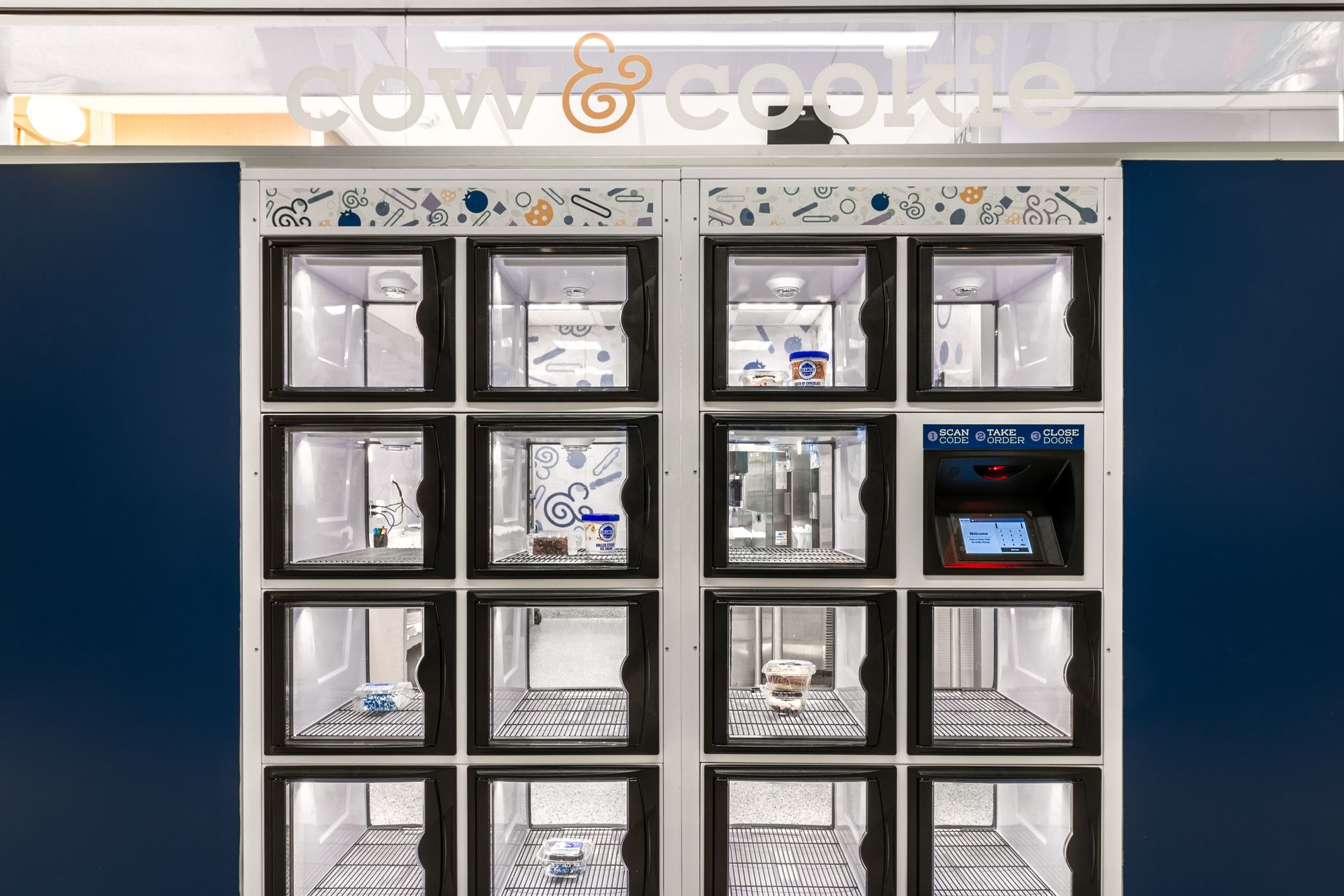 Penn State Cow & Cookie's shelved compartments holding papers and items.