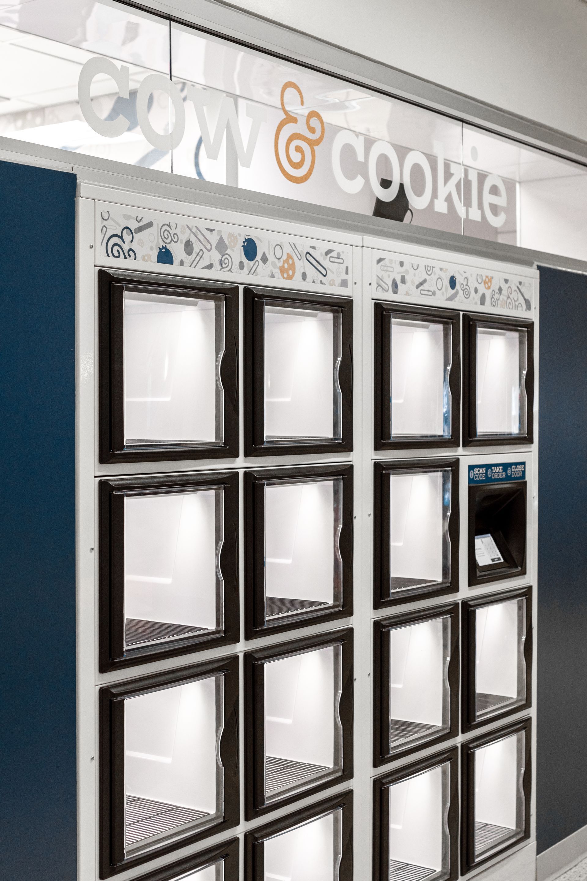 Penn State Cow & Cookie's display with black-framed boxes