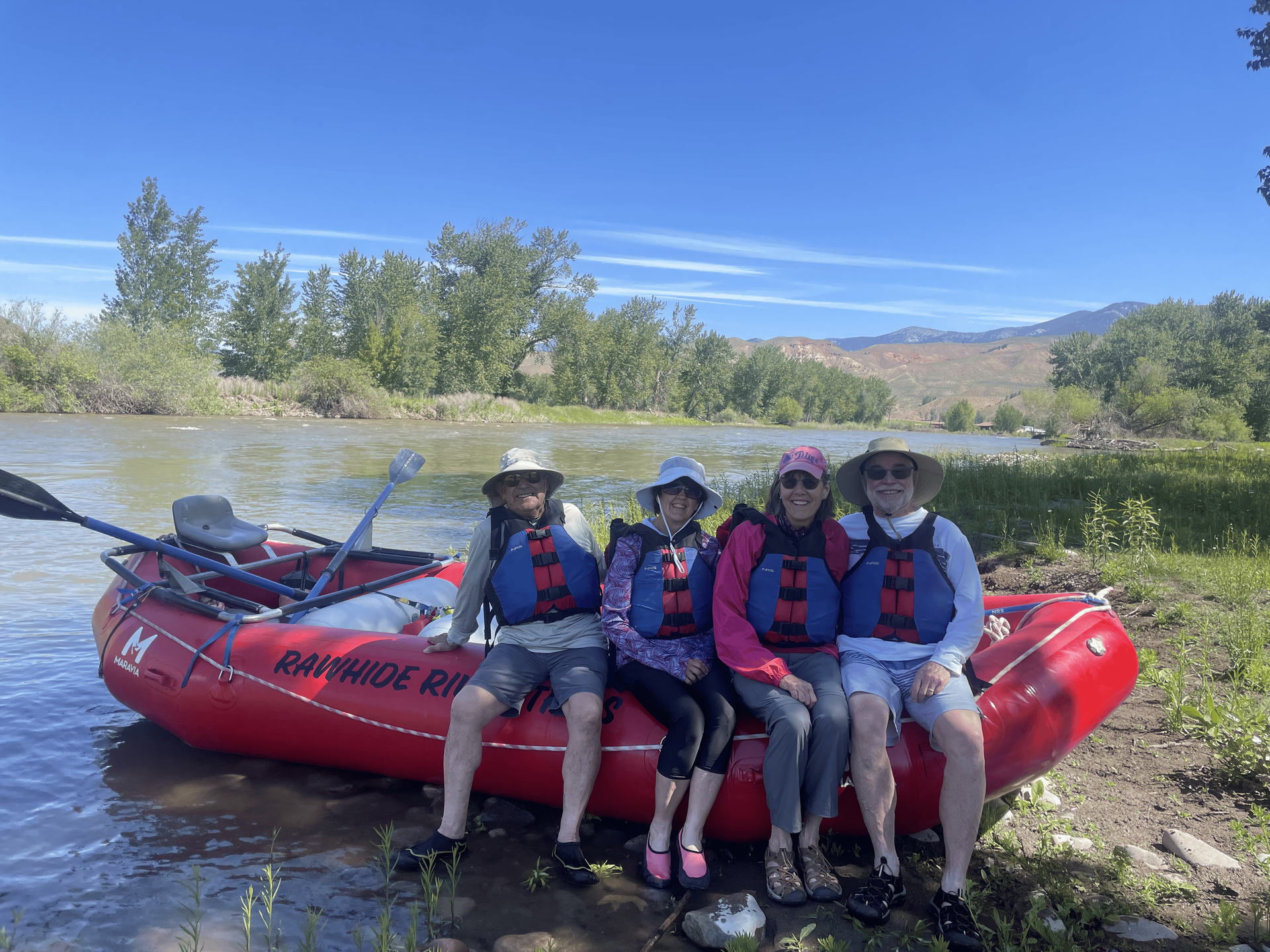 A group enjoying a whitewater day trip on the Salmon River in Idaho.