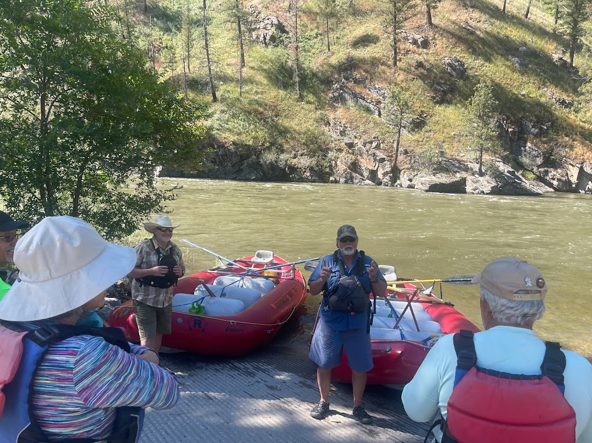 Happy family rafting on the Salmon River in Idaho