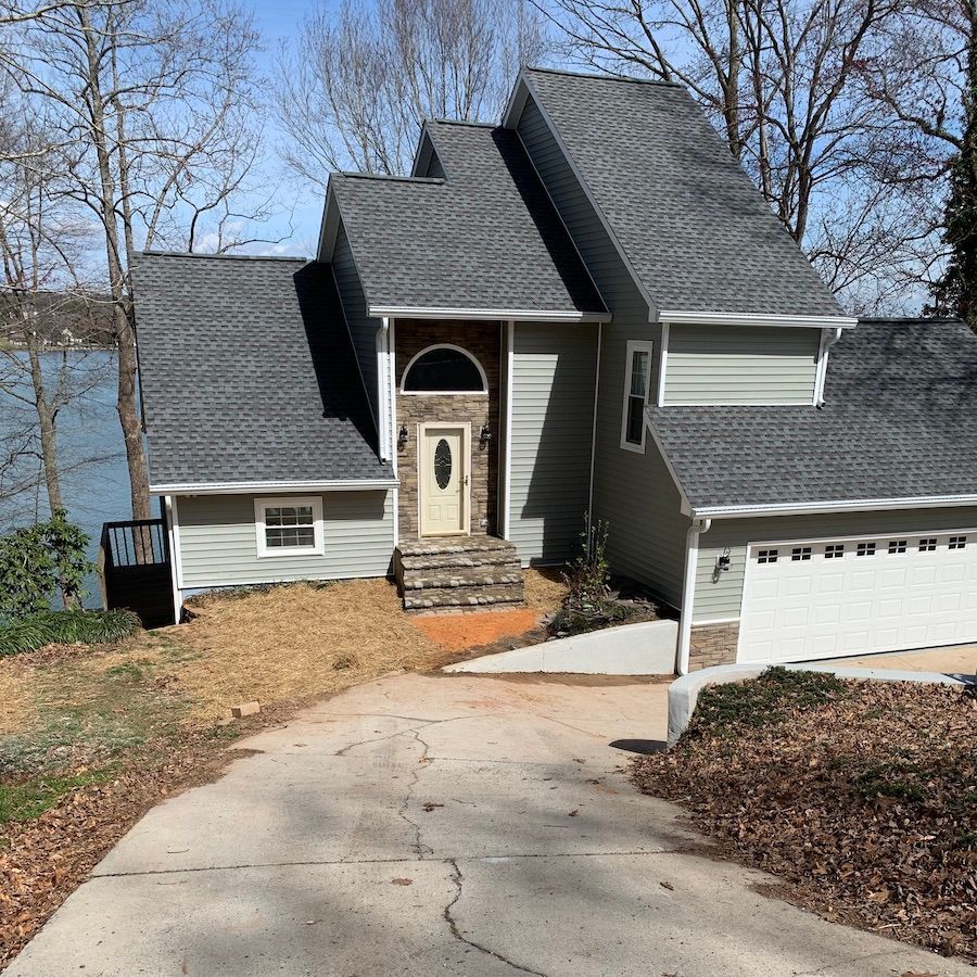 New Vinyl siding and shingle roof