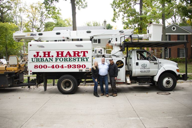Two Men And One Girl Smiling Together | Sterling Heights, MI | J.H. Hart Urban Forestry