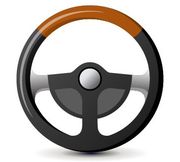 A black steering wheel with a brown rim on a white background