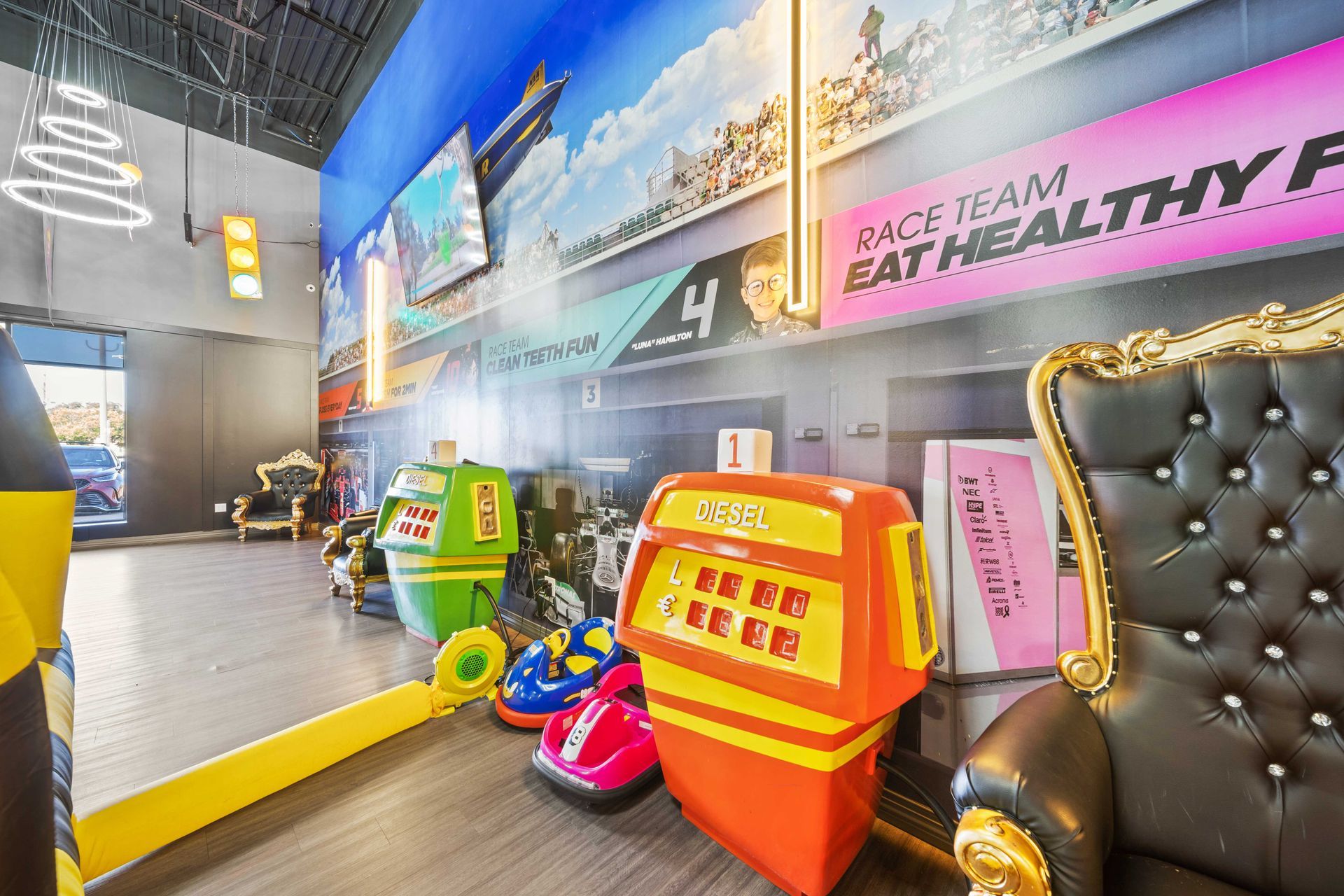 Grand Prix Dental in Katy, TX A room with a lot of toys and a chair.