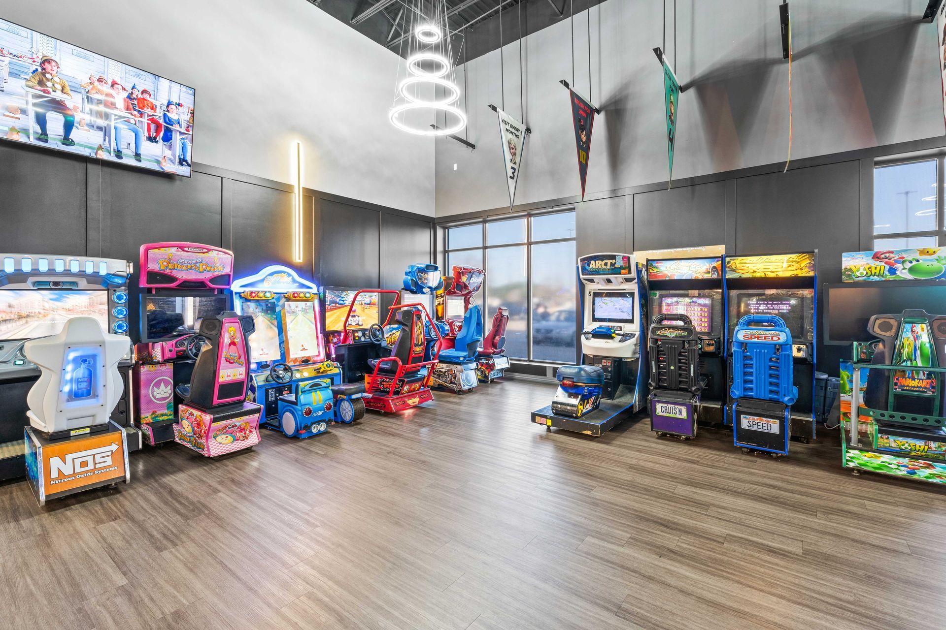 Grand Prix Dental in Katy, TX A large room filled with lots of arcade games.