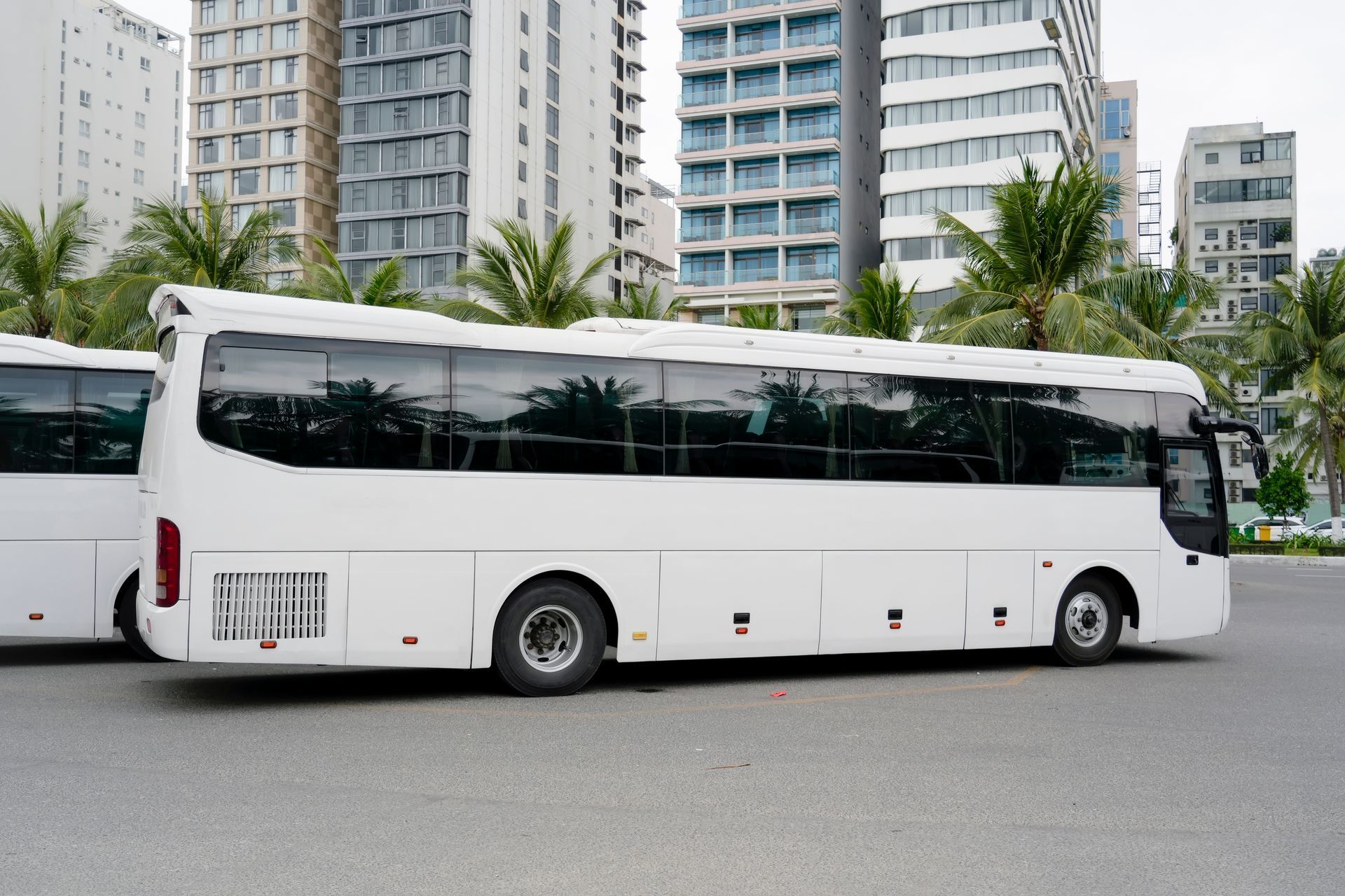 A white charter bus. A white charter bus.