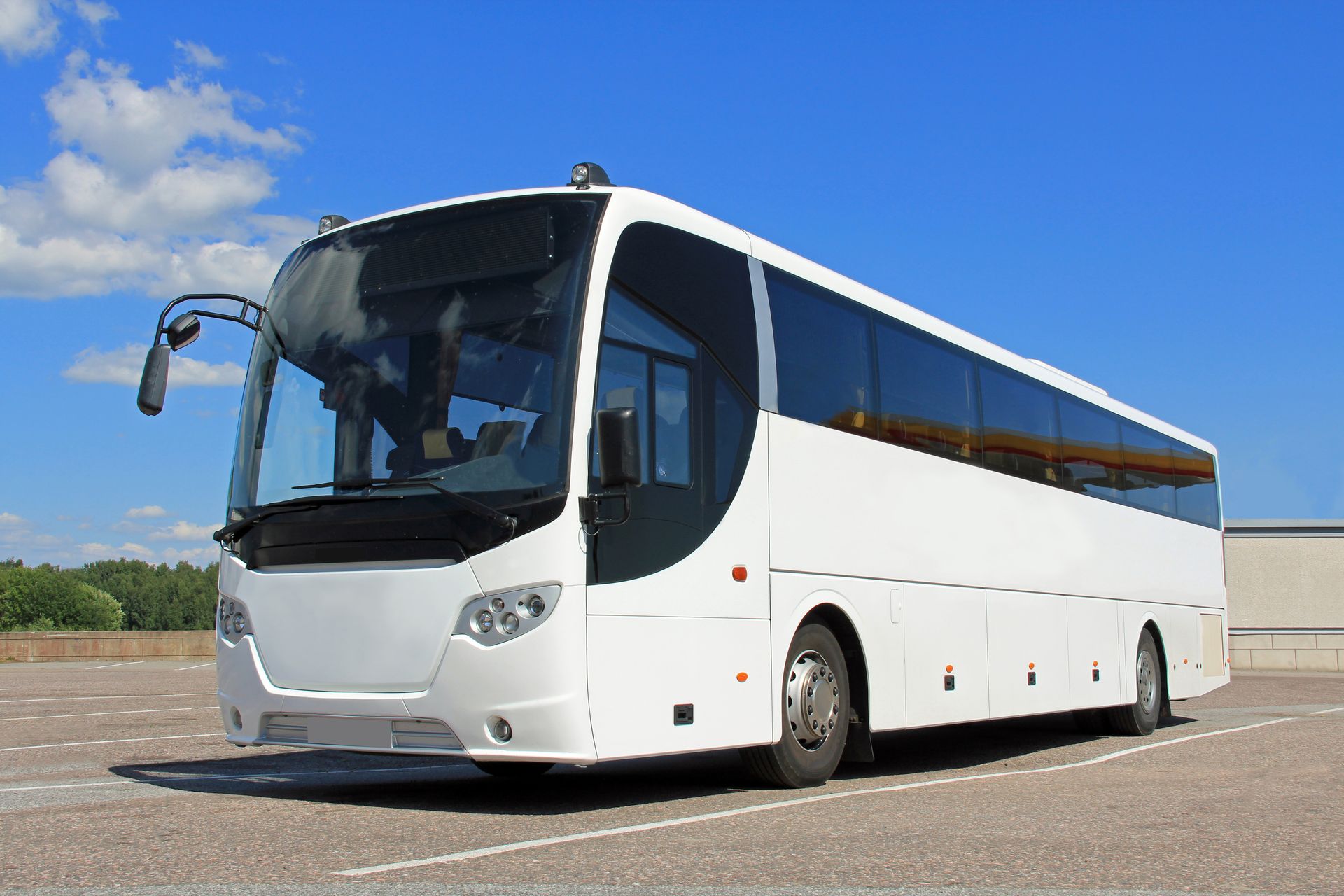 A white charter bus. A white charter bus.