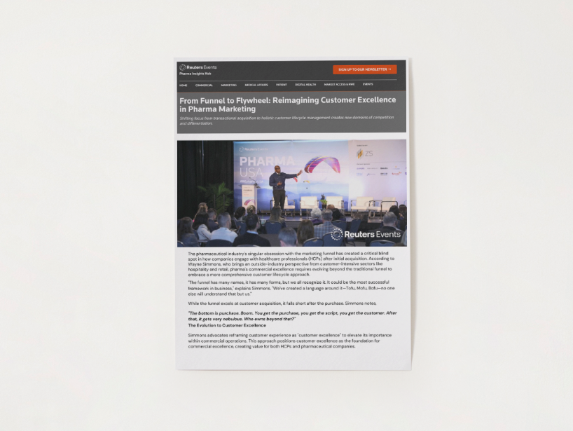 Website article page with a large stage presentation photo and text below, in dark header layout