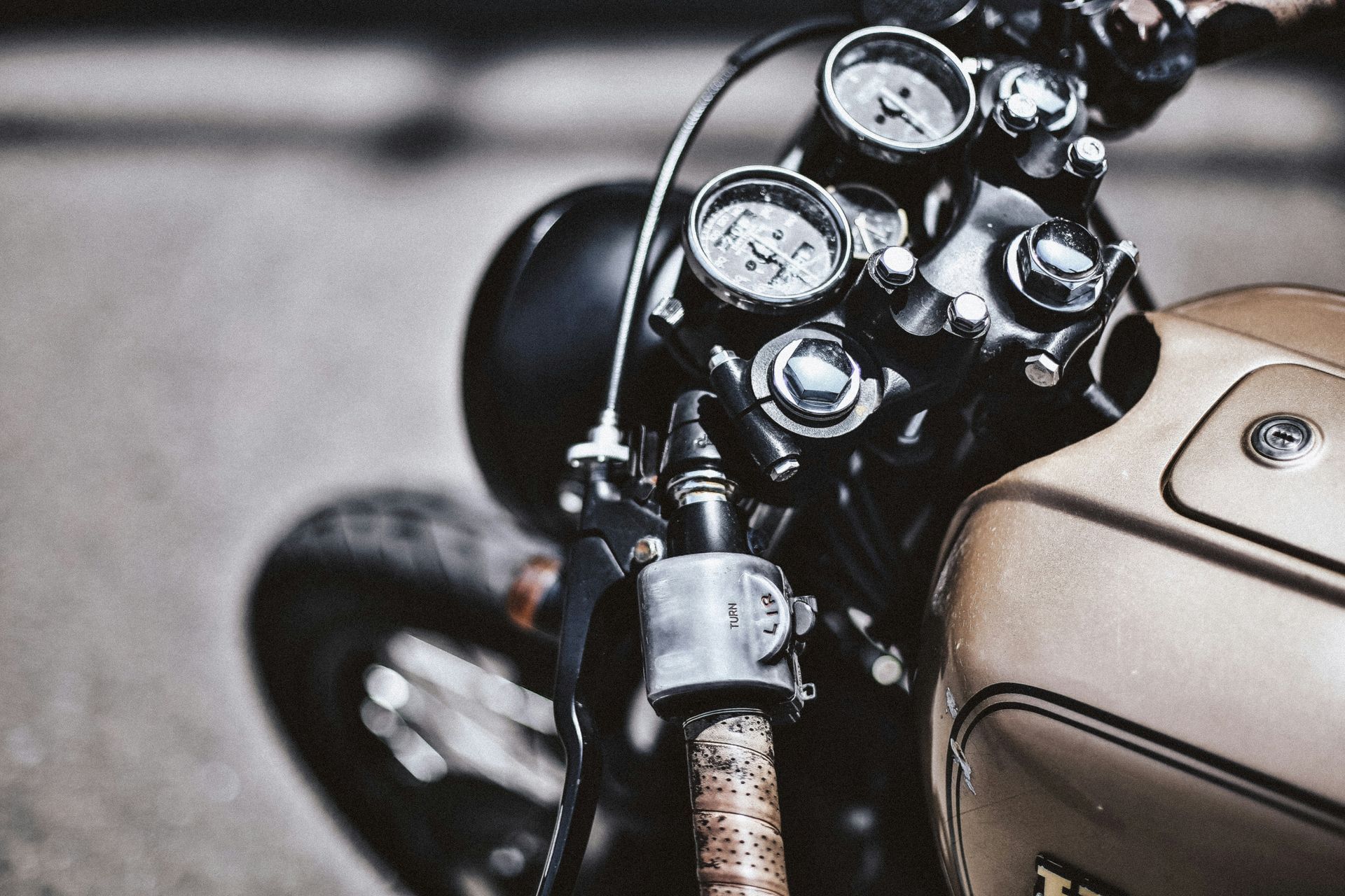 A close up of a motorcycle with the word triumph on it