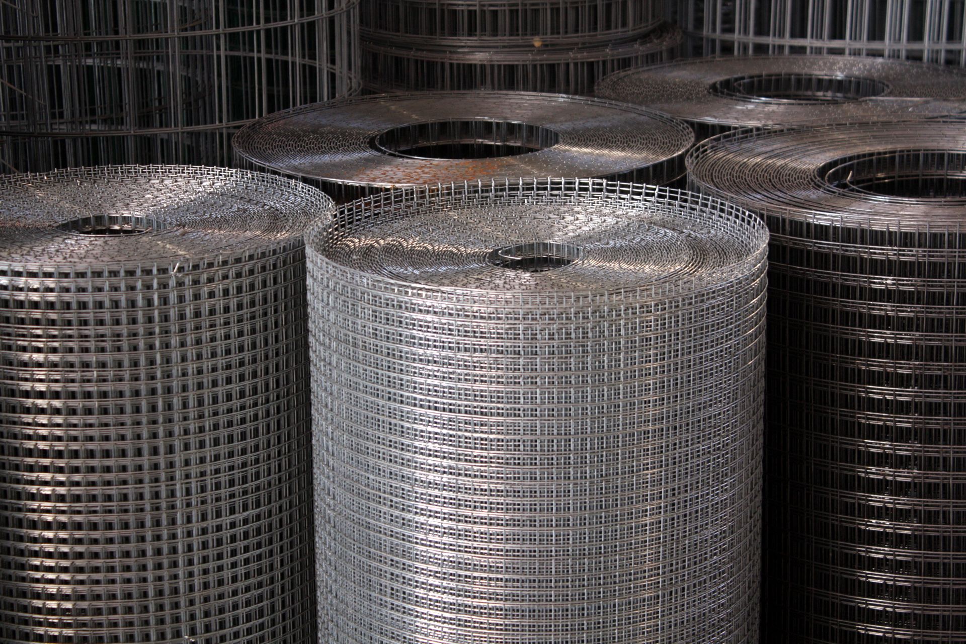 Close-up of welded wire mesh showing strong, interconnected wires ideal for fencing & reinforcement.