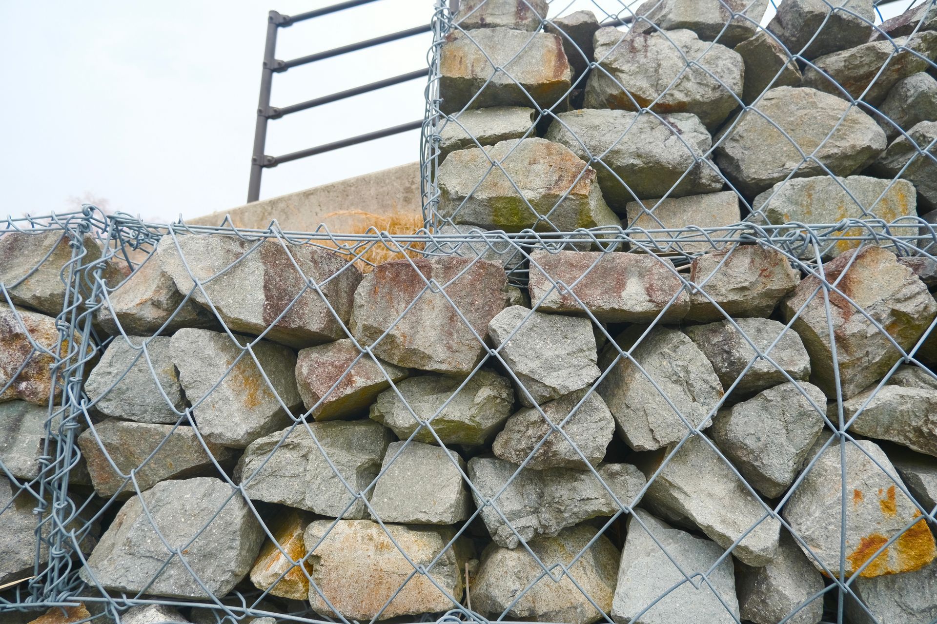 Professional heavy duty wire mesh supplier offering gabion baskets filled with natural stone. Professional heavy duty wire mesh supplier offering gabion baskets filled with natural stone.