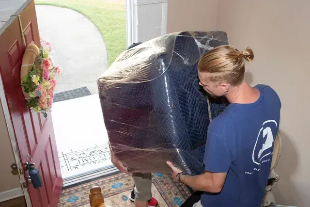 Moving boxes and furniture prepared for loading