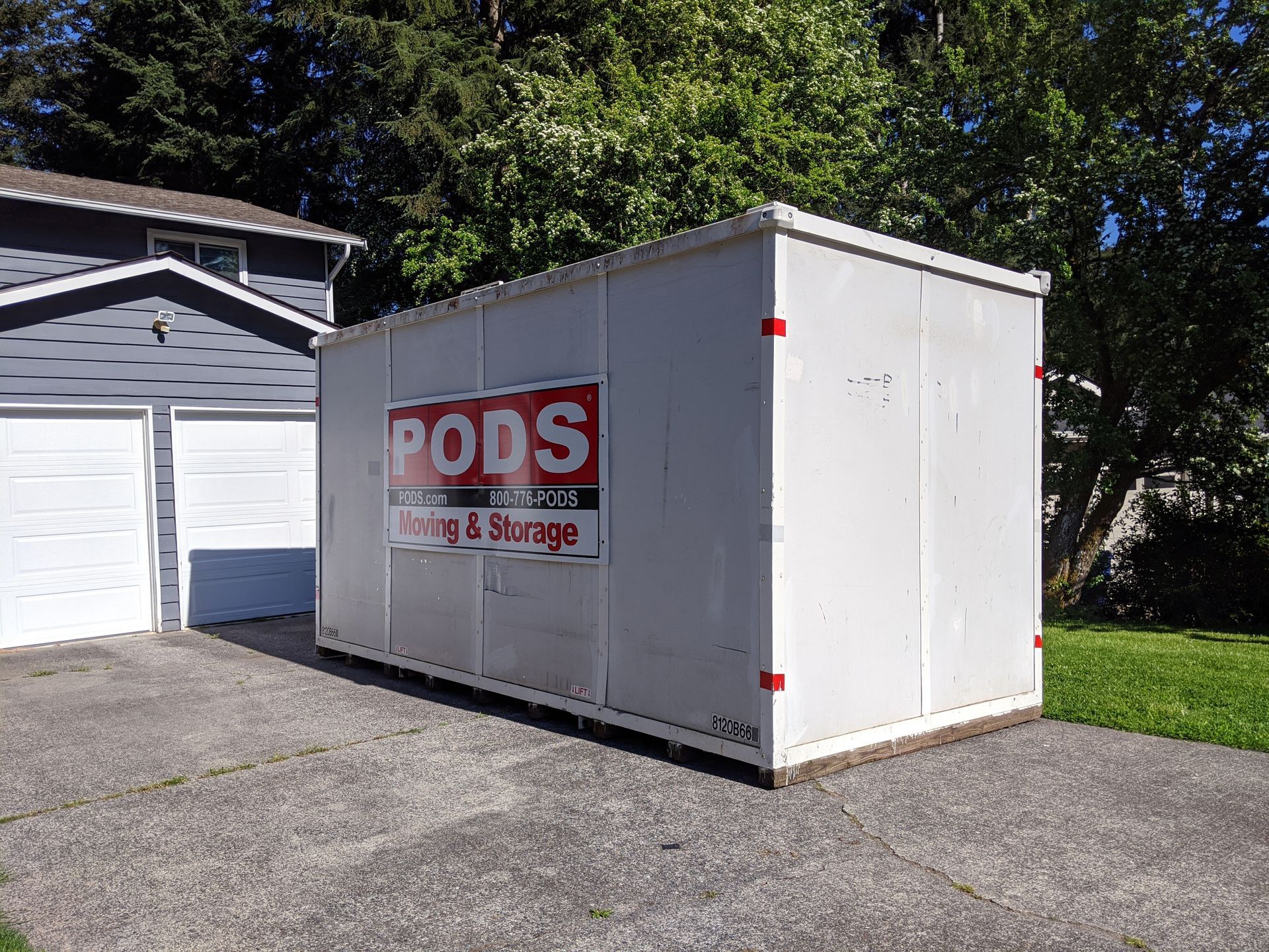 Moving boxes and furniture prepared for loading