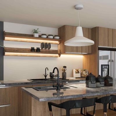 Modern kitchen with wood cabinetry, granite countertops, backlit open shelves, and a white pendant light.