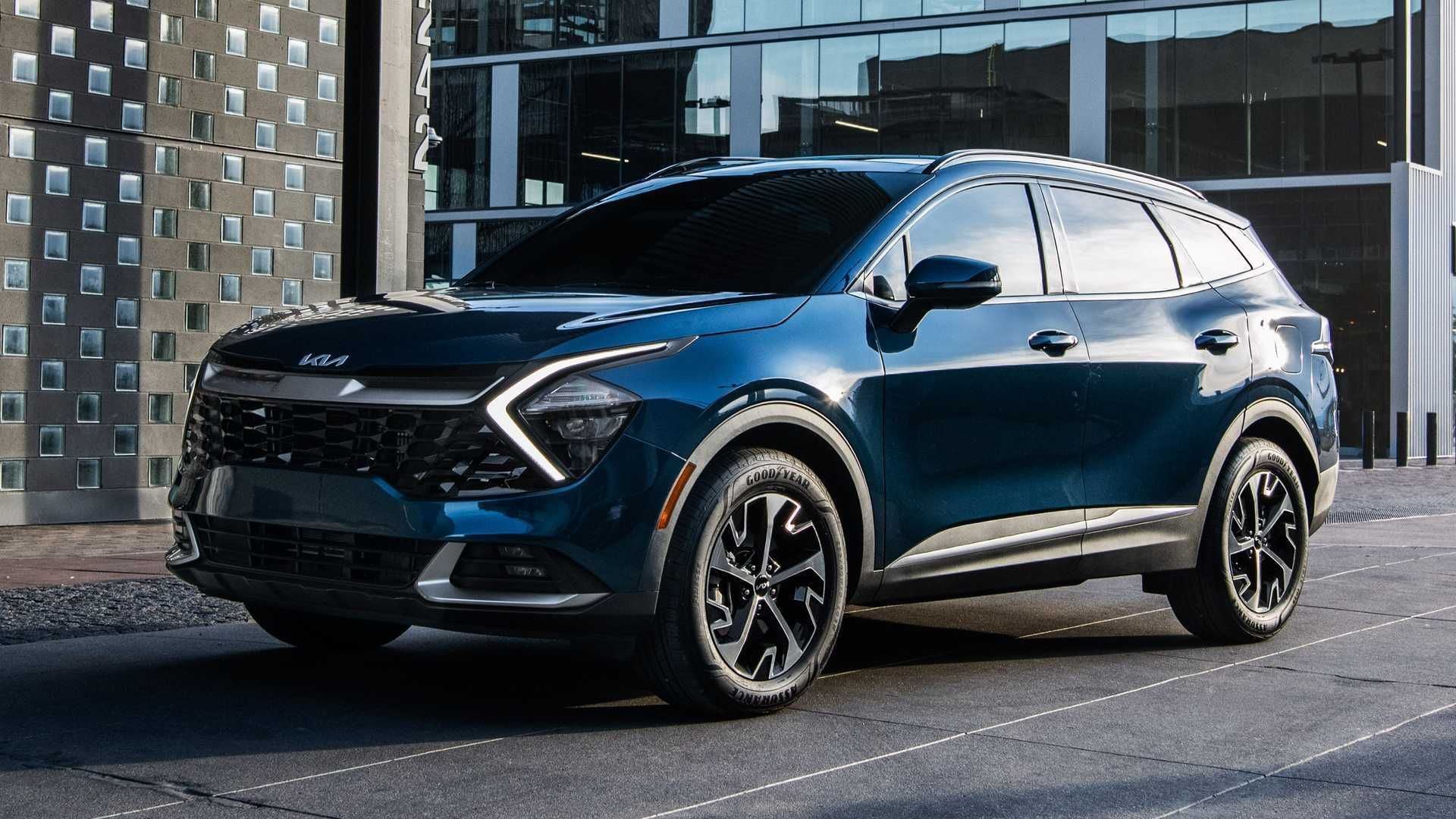 Dark blue SUV parked outside a modern glass building