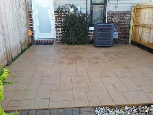 After professional paver cleaning in Belleville, IL. SprytNa Exterior restored dirty stone to a like-new, clean finish