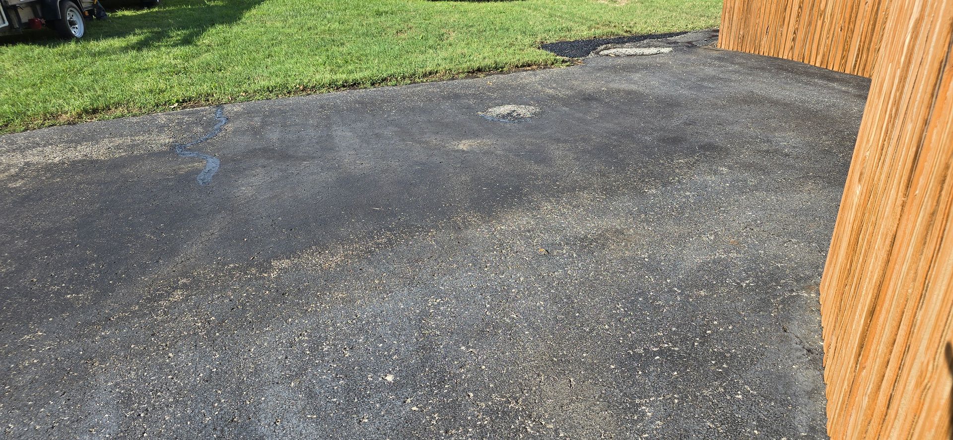 Oil Stained Asphalt Driveway