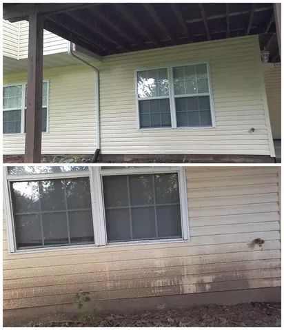 Before and after 2-story residential soft wash in O'Fallon. SprytNa Exterior removing algae and grime from vinyl siding.