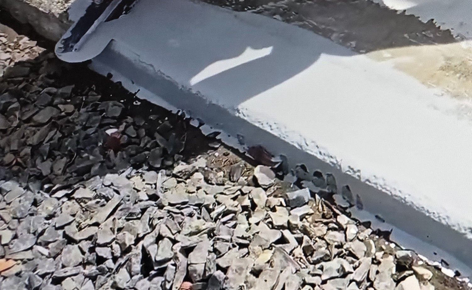 Applying Concrete Overlay to sidewalk
