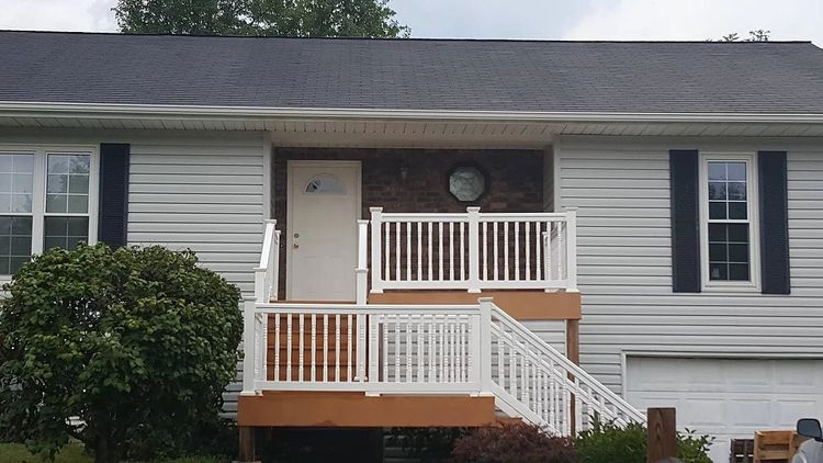 SprytNa Exterior Cleaning: Clean vinyl siding and deck after a professional soft wash service in O'Fallon, IL.