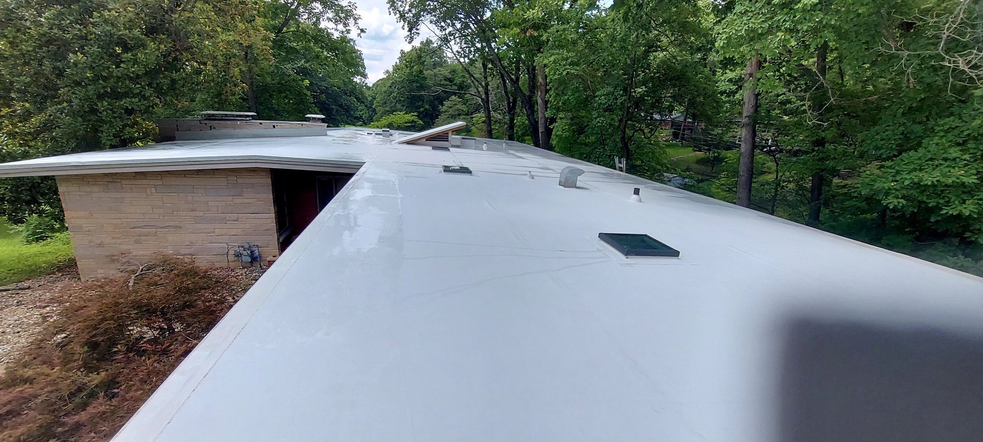 after: clean white membrane roof