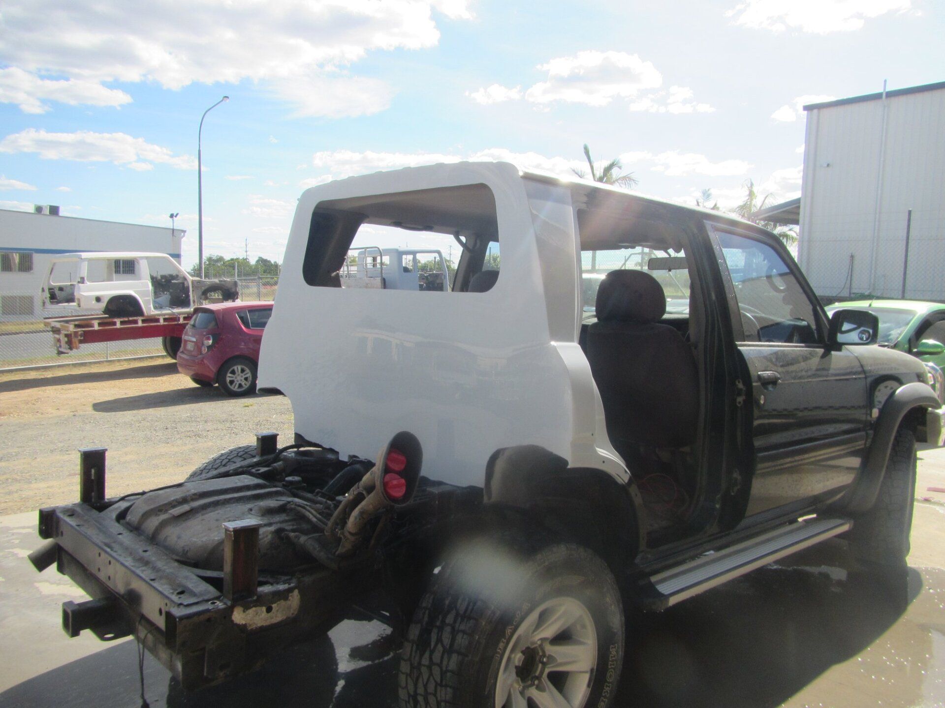 White Ute Being Repaired — Truck Repair in Rockhampton, QLD