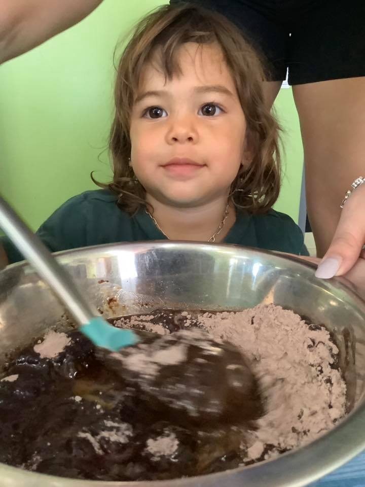 Kid Mixing Batter — Child Care in Bowen, QLD