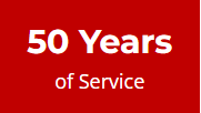 A red sign that says 50 years of service on it
