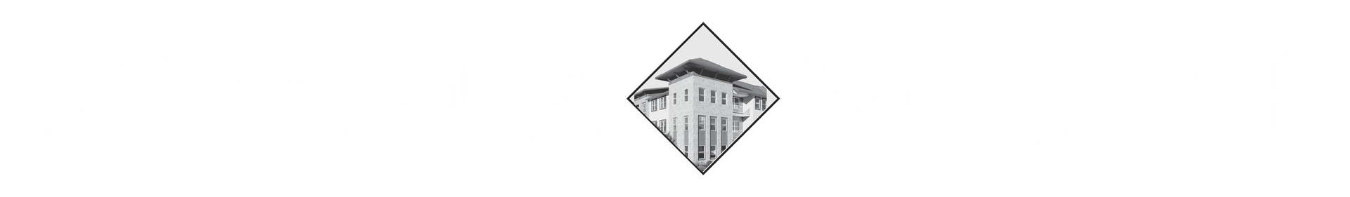 A small, diamond-shaped icon featuring a black-and-white graphic of a multi-storied building.