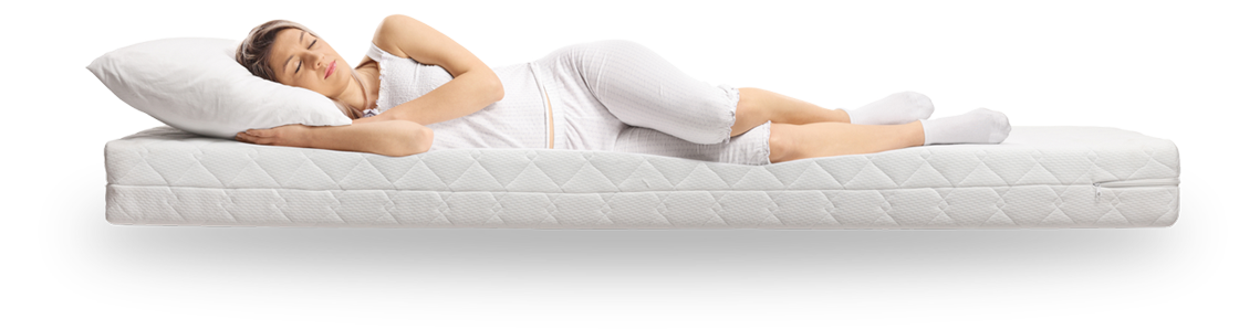 Woman Sleeping Comfortably on a Mattress