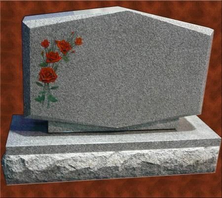 Gray granite tombstone with red rose design.