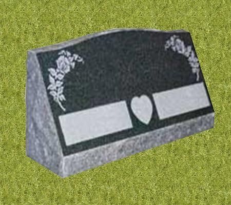 Black granite cemetery marker with white rose design, heart, and blank rectangular name spaces.