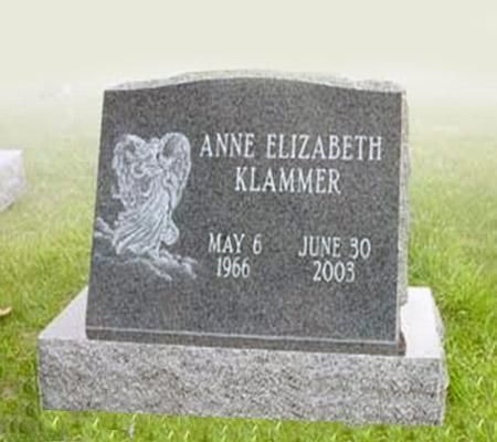 Headstone of Anne Elizabeth Klammer: Dates 1966-2003, with an etched angel on a grassy background.