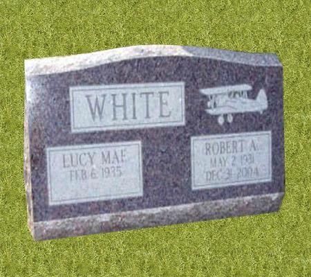 Tombstone for the White family. Displays