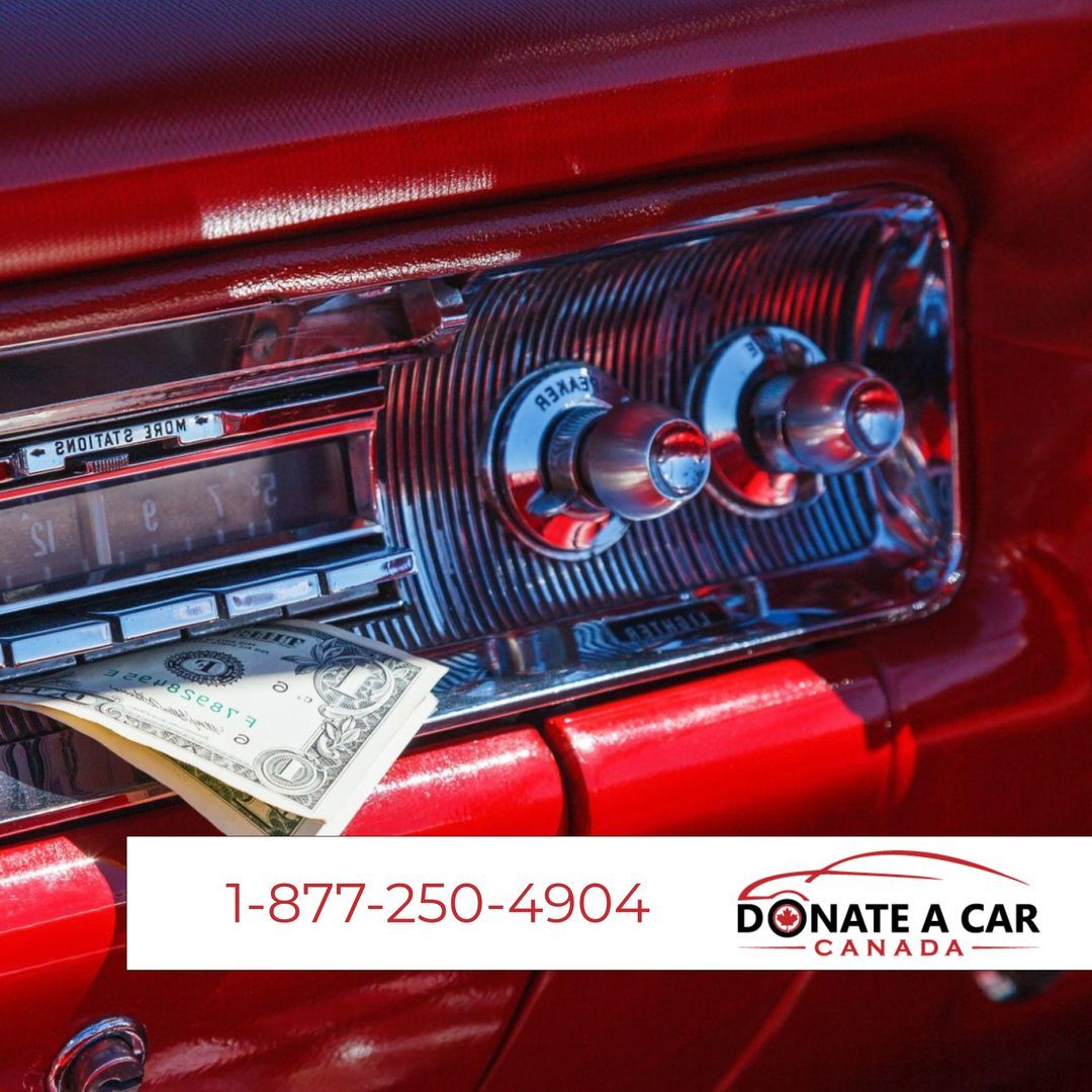 Classic car radio with a dollar bill, red car, with a phone number and