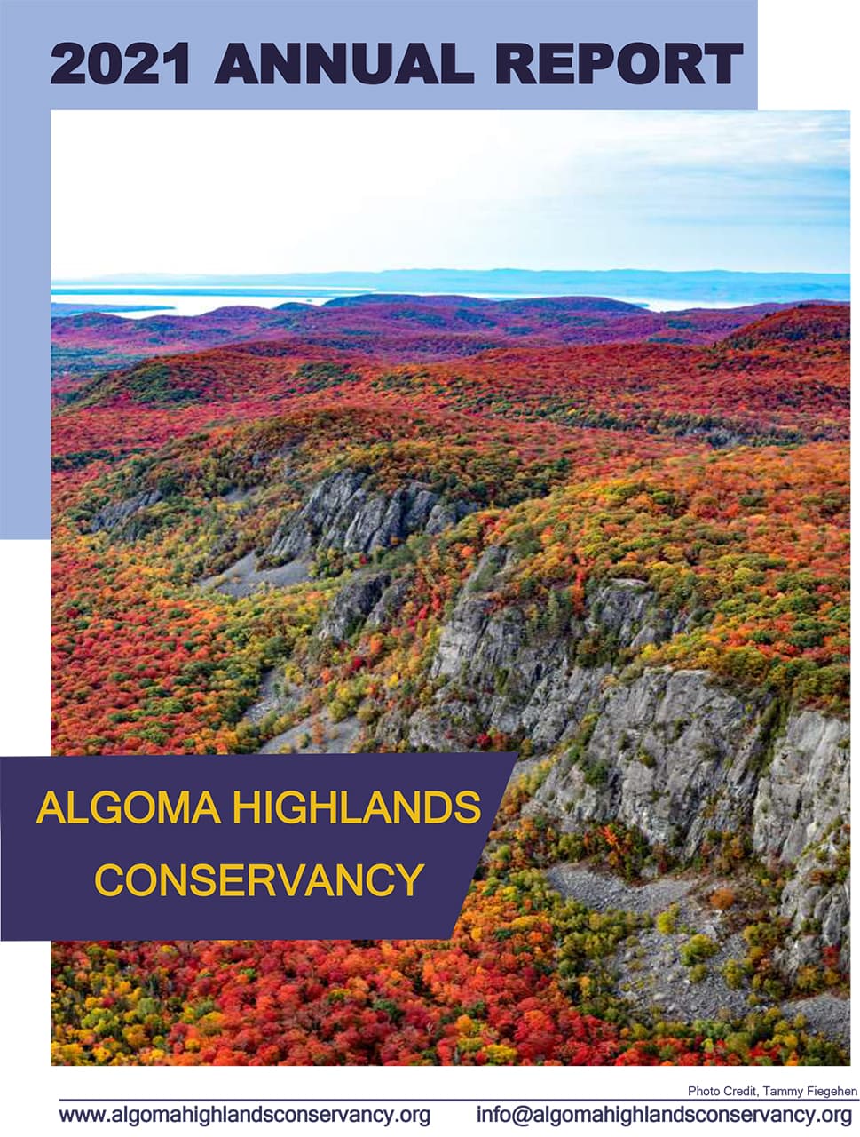 2021 annual report cover for Algoma Highlands Conservancy showing autumn cliffs and forest landscape