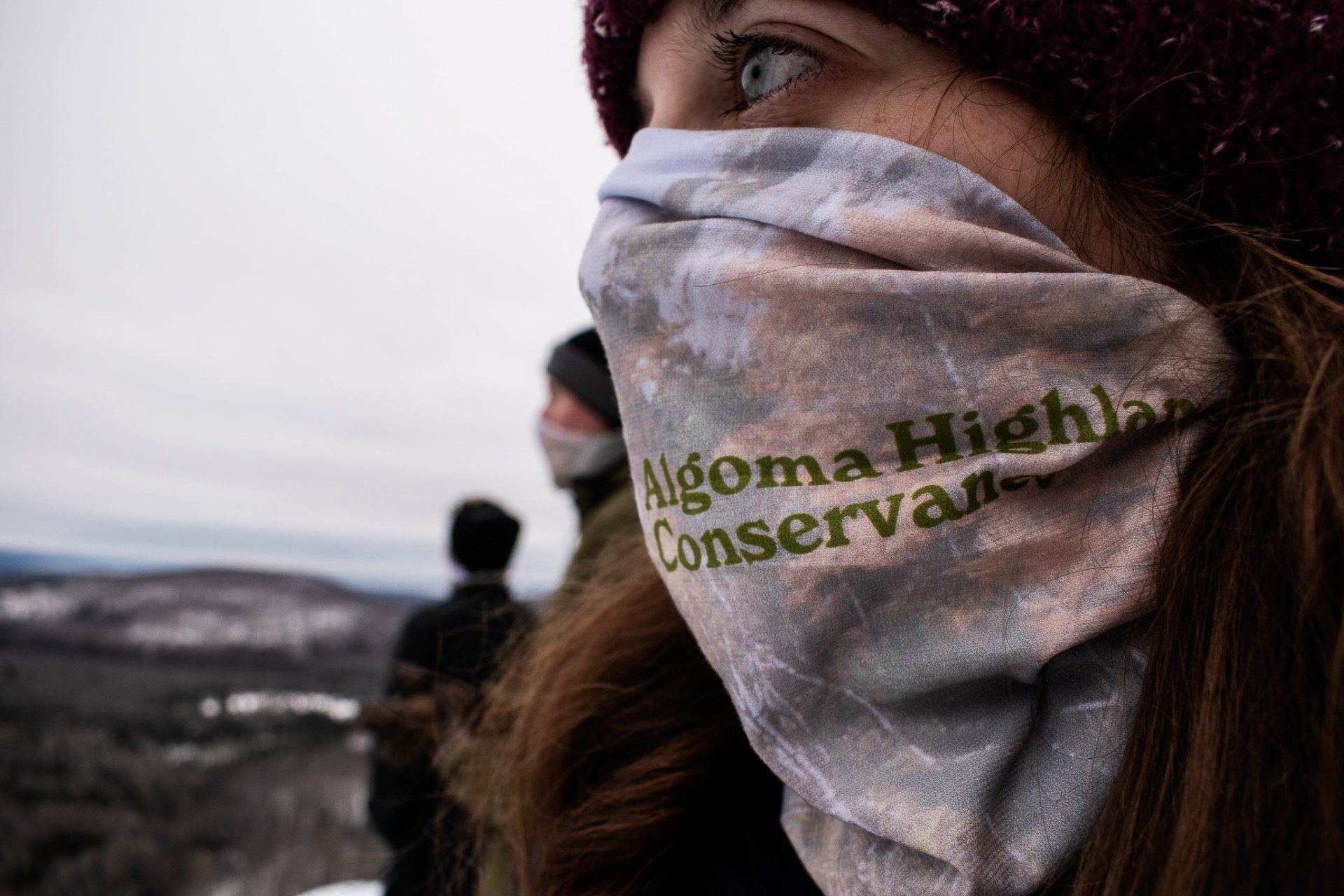 Woman wearing a buff with