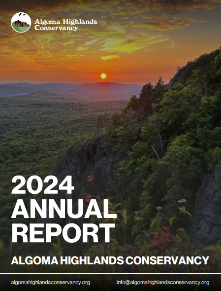 Algoma Highlands Conservancy 2024 annual report cover with a sunset over forested hills and cliffs.