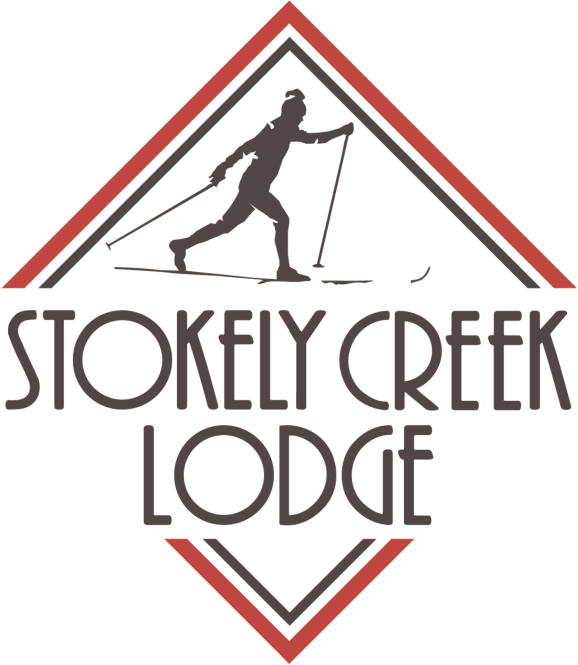 Stokely Creek Lodge logo with a hiker in a red diamond frame
